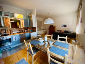 Studio apartment, view over the roofs for the sunrise, Helsinki
